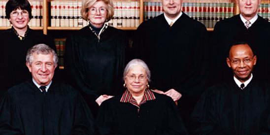 Supreme Court 2000 - (Front) Gary S. Stein, Chief Justice Deborah T. Poritz, James H. Coleman Jr. (Back) Jaynee LaVecchia, Virginia Long, Peter Verniero, James R. Zazzali